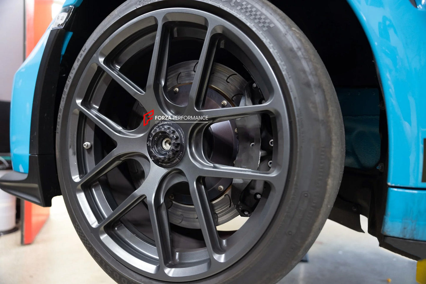 High-performance lightweight forged aluminum wheel for Porsche GT3, featuring precision engineering, exceptional strength, and a polished finish, designed for track and high-performance driving.