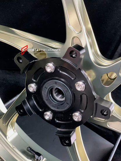 We manufacture premium quality forged motorcycle wheels rims for CFMOTO 450SR in any design, size, color.

Wheel sizes (motorcycle spec):

Front: 3.0 x 17

Rear: 4.0 x 17

Weight:

Front: 3.5 kg (7.72 lbs)

Rear: 4.55 kg (10.03 lbs)


Finishing: Gloss Bronze

Forza Performance Group engineers and manufactures each forged motorcycle wheel individually per order. This ensures precise fitment, uncompromised strength, and unique styling. Whether for racing, touring, or daily use — our wheels are built for both 