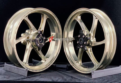 We manufacture premium quality forged motorcycle wheels rims for CFMOTO 450SR in any design, size, color.

Wheel sizes (motorcycle spec):

Front: 3.0 x 17

Rear: 4.0 x 17

Weight:

Front: 3.5 kg (7.72 lbs)

Rear: 4.55 kg (10.03 lbs)


Finishing: Gloss Bronze

Forza Performance Group engineers and manufactures each forged motorcycle wheel individually per order. This ensures precise fitment, uncompromised strength, and unique styling. Whether for racing, touring, or daily use — our wheels are built for both 