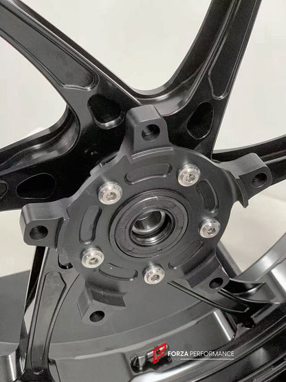 We manufacture premium quality forged motorcycle wheels rims for CFMOTO 450SRS in any design, size, color.

Wheel sizes (motorcycle spec):

Front: 3.0 x 17

Rear: 4.0 x 17

Weight:

Front: 3.6 kg (7.94 lbs)

Rear: 4 kg (8.82 lbs)


Finishing: Gloss Black

Forza Performance Group engineers and manufactures each forged motorcycle wheel individually per order. This ensures precise fitment, uncompromised strength, and unique styling. Whether for racing, touring, or daily use — our wheels are built for both perf