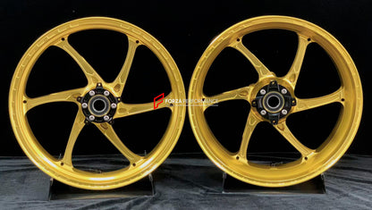 We manufacture premium quality forged motorcycle wheels rims for HONDA CBR1000RRR in any design, size, color.

Wheel sizes (motorcycle spec):

Front: 3.5 x 17

Rear: 6 x 17

Weight:

Front: 3.55 kg (7.83 lbs)

Rear: 4.55 kg (10.03 lbs)

Finishing: Satin Gold

Forza Performance Group engineers and manufactures each forged motorcycle wheel individually per order. This ensures precise fitment, uncompromised strength, and unique styling. Whether for racing, touring, or daily use — our wheels are built for both 