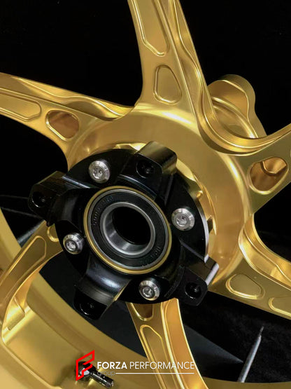 We manufacture premium quality forged motorcycle wheels rims for HONDA CBR1000RRR in any design, size, color.

Wheel sizes (motorcycle spec):

Front: 3.5 x 17

Rear: 6 x 17

Weight:

Front: 3.55 kg (7.83 lbs)

Rear: 4.55 kg (10.03 lbs)

Finishing: Satin Gold

Forza Performance Group engineers and manufactures each forged motorcycle wheel individually per order. This ensures precise fitment, uncompromised strength, and unique styling. Whether for racing, touring, or daily use — our wheels are built for both 