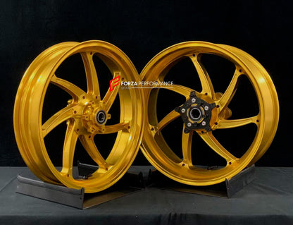 We manufacture premium quality forged motorcycle wheels rims for BMW S1000RR M1000RR in any design, size, color.

Wheel sizes (motorcycle spec):

Front: 3.5 x 17

Rear: 6 x 17

Weight:

Front: 3.6 kg (7.94 lbs)

Rear: 4.45 kg (9.81 lbs)

Finishing: Gloss Gold

Forza Performance Group engineers and manufactures each forged motorcycle wheel individually per order. This ensures precise fitment, uncompromised strength, and unique styling. Whether for racing, touring, or daily use — our wheels are built for both