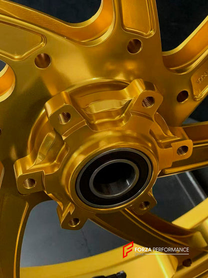 We manufacture premium quality forged motorcycle wheels rims for BMW S1000RR M1000RR in any design, size, color.

Wheel sizes (motorcycle spec):

Front: 3.5 x 17

Rear: 6 x 17

Weight:

Front: 3.6 kg (7.94 lbs)

Rear: 4.45 kg (9.81 lbs)

Finishing: Gloss Gold

Forza Performance Group engineers and manufactures each forged motorcycle wheel individually per order. This ensures precise fitment, uncompromised strength, and unique styling. Whether for racing, touring, or daily use — our wheels are built for both