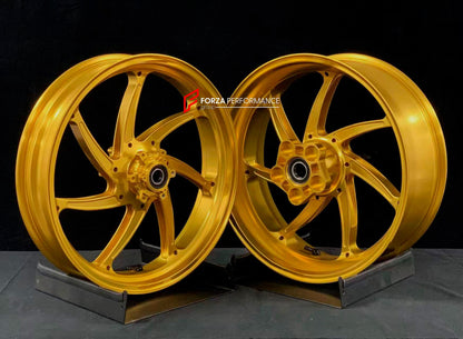 We manufacture premium quality forged motorcycle wheels rims for BMW S1000RR M1000RR in any design, size, color.

Wheel sizes (motorcycle spec):

Front: 3.5 x 17

Rear: 6 x 17

Weight:

Front: 3.6 kg (7.94 lbs)

Rear: 4.45 kg (9.81 lbs)

Finishing: Gloss Gold

Forza Performance Group engineers and manufactures each forged motorcycle wheel individually per order. This ensures precise fitment, uncompromised strength, and unique styling. Whether for racing, touring, or daily use — our wheels are built for both