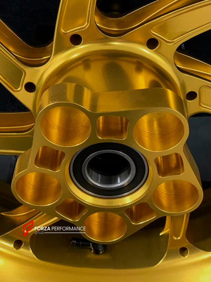 We manufacture premium quality forged motorcycle wheels rims for BMW S1000RR M1000RR in any design, size, color.

Wheel sizes (motorcycle spec):

Front: 3.5 x 17

Rear: 6 x 17

Weight:

Front: 3.6 kg (7.94 lbs)

Rear: 4.45 kg (9.81 lbs)

Finishing: Gloss Gold

Forza Performance Group engineers and manufactures each forged motorcycle wheel individually per order. This ensures precise fitment, uncompromised strength, and unique styling. Whether for racing, touring, or daily use — our wheels are built for both