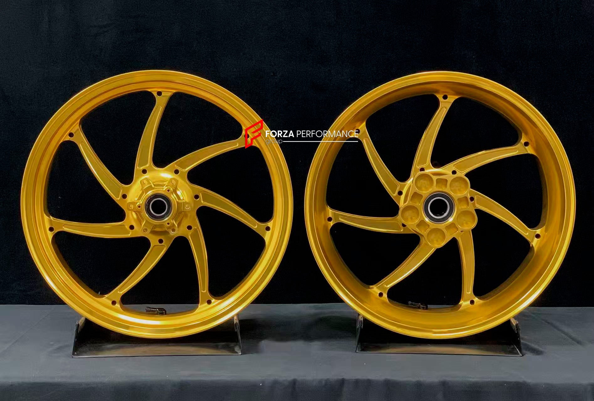 We manufacture premium quality forged motorcycle wheels rims for BMW S1000RR M1000RR in any design, size, color.

Wheel sizes (motorcycle spec):

Front: 3.5 x 17

Rear: 6 x 17

Weight:

Front: 3.6 kg (7.94 lbs)

Rear: 4.45 kg (9.81 lbs)

Finishing: Gloss Gold

Forza Performance Group engineers and manufactures each forged motorcycle wheel individually per order. This ensures precise fitment, uncompromised strength, and unique styling. Whether for racing, touring, or daily use — our wheels are built for both