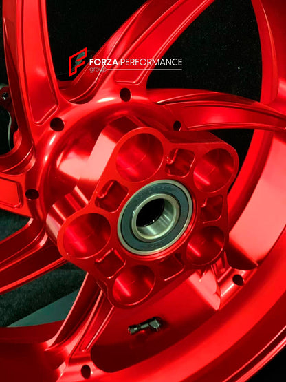 We manufacture premium quality forged motorcycle wheels rims for S1000RR M1000RR in any design, size, color.

Wheel sizes (motorcycle spec):

Front: 3.5 x 17

Rear: 6 x 17

Weight:

Front: 4.4 kg (9.59 lbs)

Rear: 4.85 kg (10.69lbs)

Finishing: Gloss Red

Forza Performance Group engineers and manufactures each forged motorcycle wheel individually per order. This ensures precise fitment, uncompromised strength, and unique styling. Whether for racing, touring, or daily use — our wheels are built for both perf