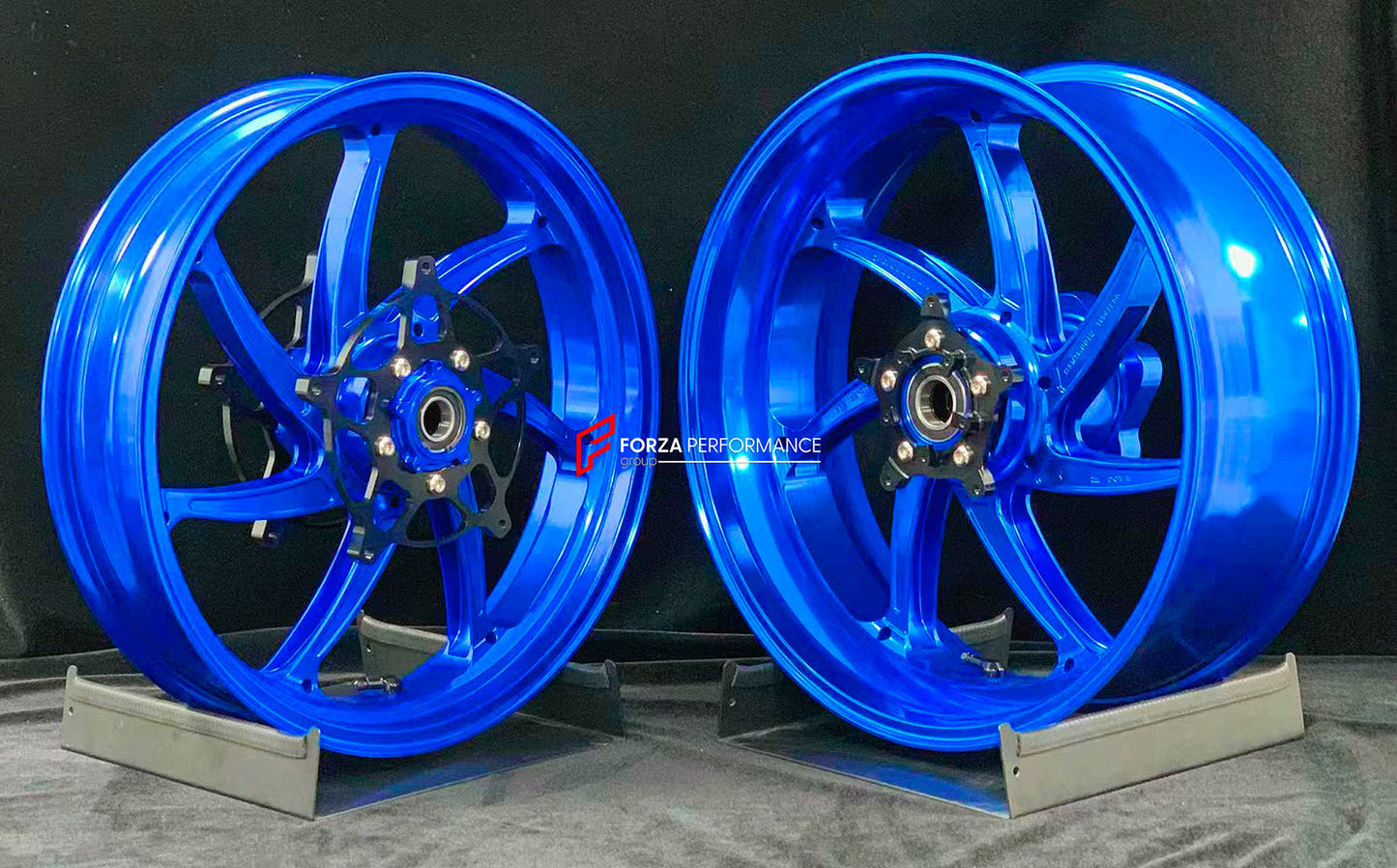 We manufacture premium quality forged motorcycle wheels rims for S1000RR M1000RR in any design, size, color.

Wheel sizes (motorcycle spec):

Front: 3.5 x 17

Rear: 6 x 17

Weight:

Front: 4.2 kg (9.26 lbs)

Rear: 4.4 kg (9.7 lbs)


Finishing: Gloss Blue

Forza Performance Group engineers and manufactures each forged motorcycle wheel individually per order. This ensures precise fitment, uncompromised strength, and unique styling. Whether for racing, touring, or daily use — our wheels are built for both perf