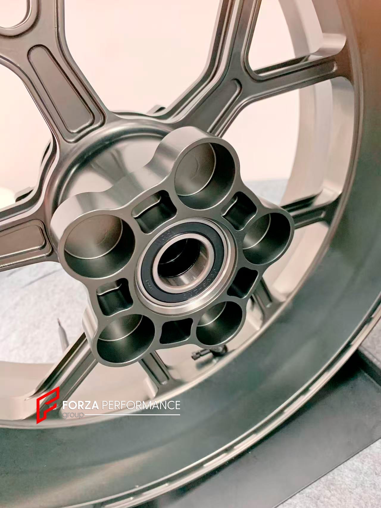 We manufacture premium quality forged motorcycle wheels rims for S1000RR M1000RR in any design, size, color.

Wheel sizes (motorcycle spec):

Front: 3.5 x 17

Rear: 6 x 17

Weight:

Front: 3.45 kg (7.6 lbs)

Rear: 3.75 kg (8.27 lbs)


Finishing: Satin Bronze

Forza Performance Group engineers and manufactures each forged motorcycle wheel individually per order. This ensures precise fitment, uncompromised strength, and unique styling. Whether for racing, touring, or daily use — our wheels are built for both 