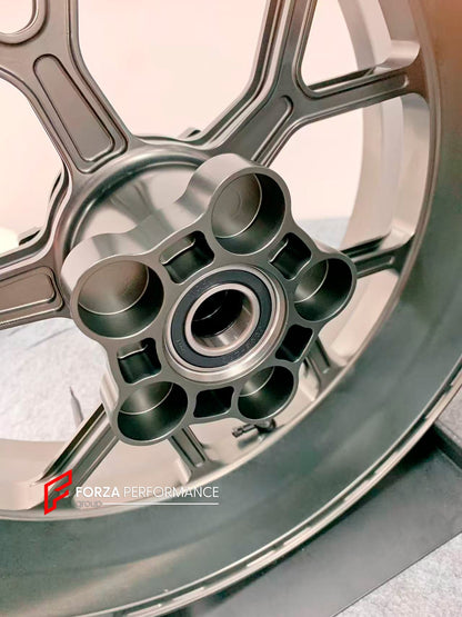 We manufacture premium quality forged motorcycle wheels rims for S1000RR M1000RR in any design, size, color.

Wheel sizes (motorcycle spec):

Front: 3.5 x 17

Rear: 6 x 17

Weight:

Front: 3.45 kg (7.6 lbs)

Rear: 3.75 kg (8.27 lbs)


Finishing: Satin Bronze

Forza Performance Group engineers and manufactures each forged motorcycle wheel individually per order. This ensures precise fitment, uncompromised strength, and unique styling. Whether for racing, touring, or daily use — our wheels are built for both 