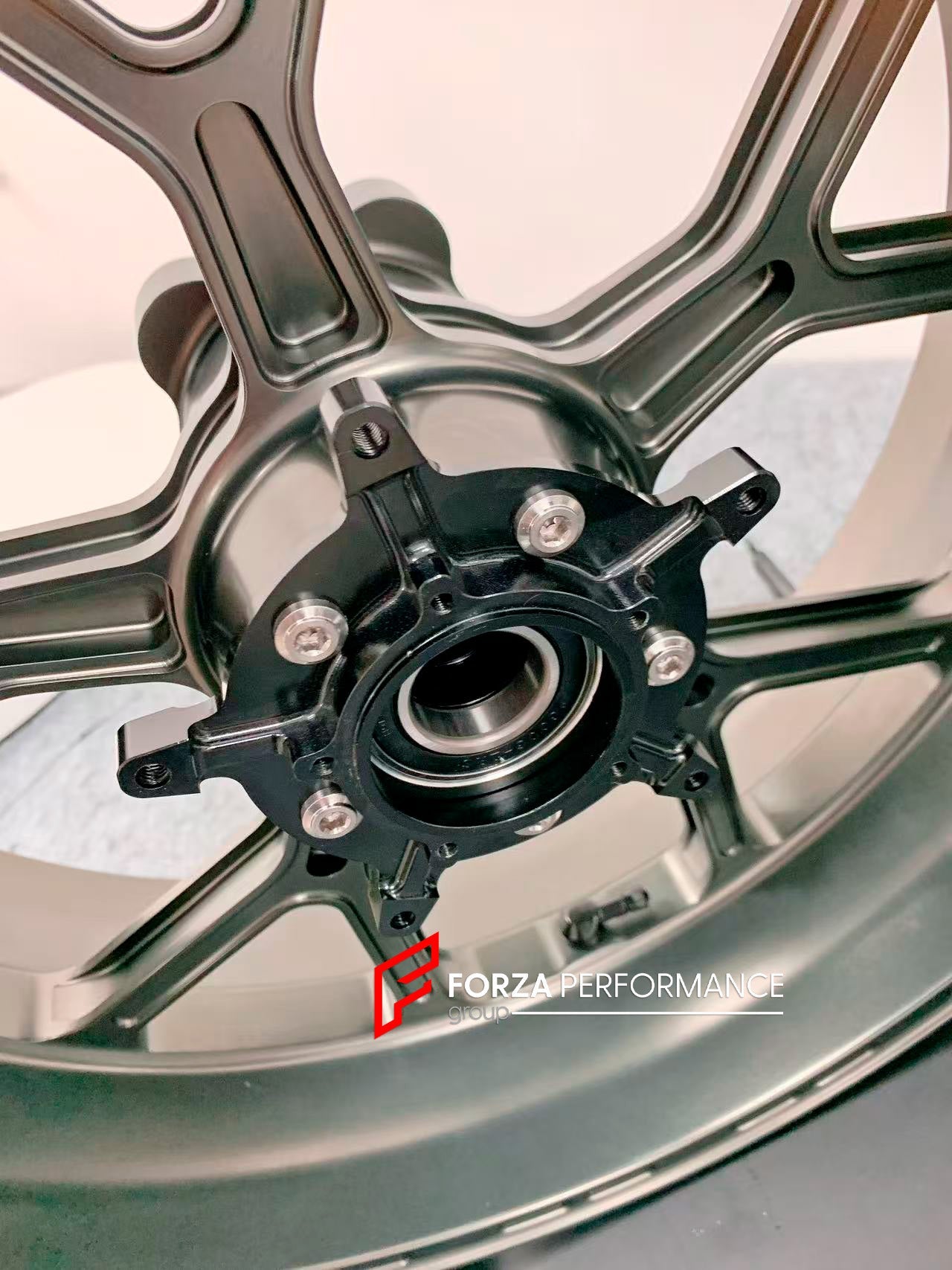 We manufacture premium quality forged motorcycle wheels rims for S1000RR M1000RR in any design, size, color.

Wheel sizes (motorcycle spec):

Front: 3.5 x 17

Rear: 6 x 17

Weight:

Front: 3.45 kg (7.6 lbs)

Rear: 3.75 kg (8.27 lbs)


Finishing: Satin Bronze

Forza Performance Group engineers and manufactures each forged motorcycle wheel individually per order. This ensures precise fitment, uncompromised strength, and unique styling. Whether for racing, touring, or daily use — our wheels are built for both 