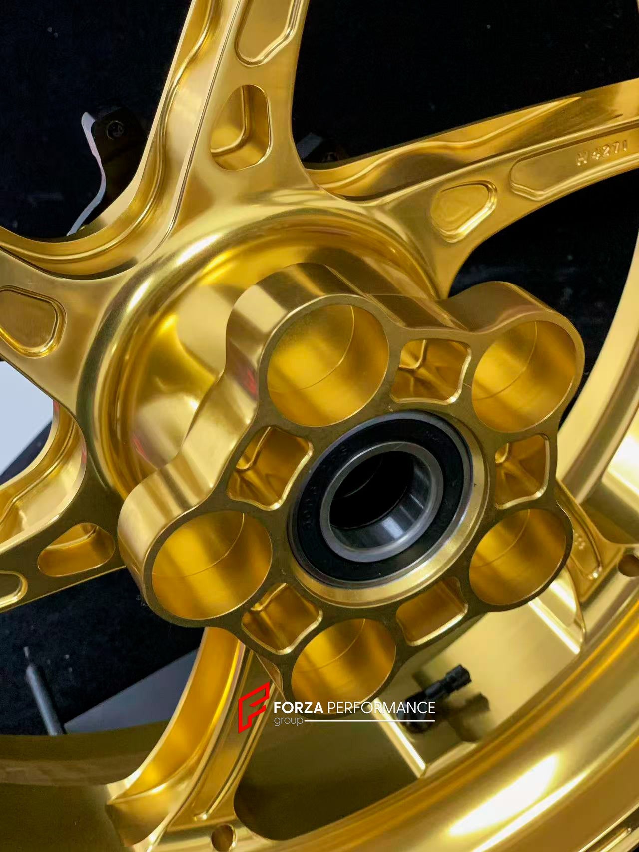 We manufacture premium quality forged motorcycle wheels rims for S1000RR M1000RR in any design, size, color.

Wheel sizes (motorcycle spec):

Front: 3.5 x 17

Rear: 6 x 17

Weight:

Front: 3.15 kg (6.94 lbs)

Rear: 4.3 kg (9.48 lbs)


Finishing: Satin Gold

Forza Performance Group engineers and manufactures each forged motorcycle wheel individually per order. This ensures precise fitment, uncompromised strength, and unique styling. Whether for racing, touring, or daily use — our wheels are built for both pe