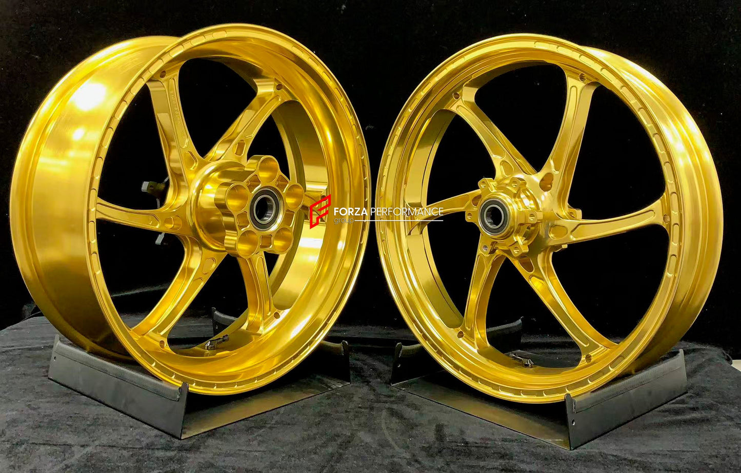 We manufacture premium quality forged motorcycle wheels rims for S1000RR M1000RR in any design, size, color.

Wheel sizes (motorcycle spec):

Front: 3.5 x 17

Rear: 6 x 17

Weight:

Front: 3.15 kg (6.94 lbs)

Rear: 4.3 kg (9.48 lbs)


Finishing: Satin Gold

Forza Performance Group engineers and manufactures each forged motorcycle wheel individually per order. This ensures precise fitment, uncompromised strength, and unique styling. Whether for racing, touring, or daily use — our wheels are built for both pe