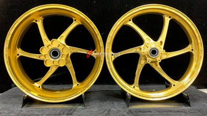 We manufacture premium quality forged motorcycle wheels rims for S1000RR M1000RR in any design, size, color.

Wheel sizes (motorcycle spec):

Front: 3.5 x 17

Rear: 6 x 17

Weight:

Front: 3.15 kg (6.94 lbs)

Rear: 4.3 kg (9.48 lbs)


Finishing: Satin Gold

Forza Performance Group engineers and manufactures each forged motorcycle wheel individually per order. This ensures precise fitment, uncompromised strength, and unique styling. Whether for racing, touring, or daily use — our wheels are built for both pe