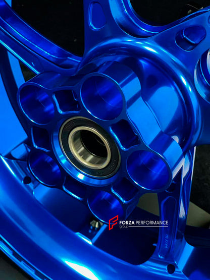 We manufacture premium quality forged motorcycle wheels rims for S1000RR M1000RR in any design, size, color.

Wheel sizes (motorcycle spec):

Front: 3.5 x 17

Rear: 6 x 17

Weight:

Front: 3.25 kg (7.16 lbs)

Rear: 4.35 kg (9.59 lbs)


Finishing: Gloss Blue

Forza Performance Group engineers and manufactures each forged motorcycle wheel individually per order. This ensures precise fitment, uncompromised strength, and unique styling. Whether for racing, touring, or daily use — our wheels are built for both p