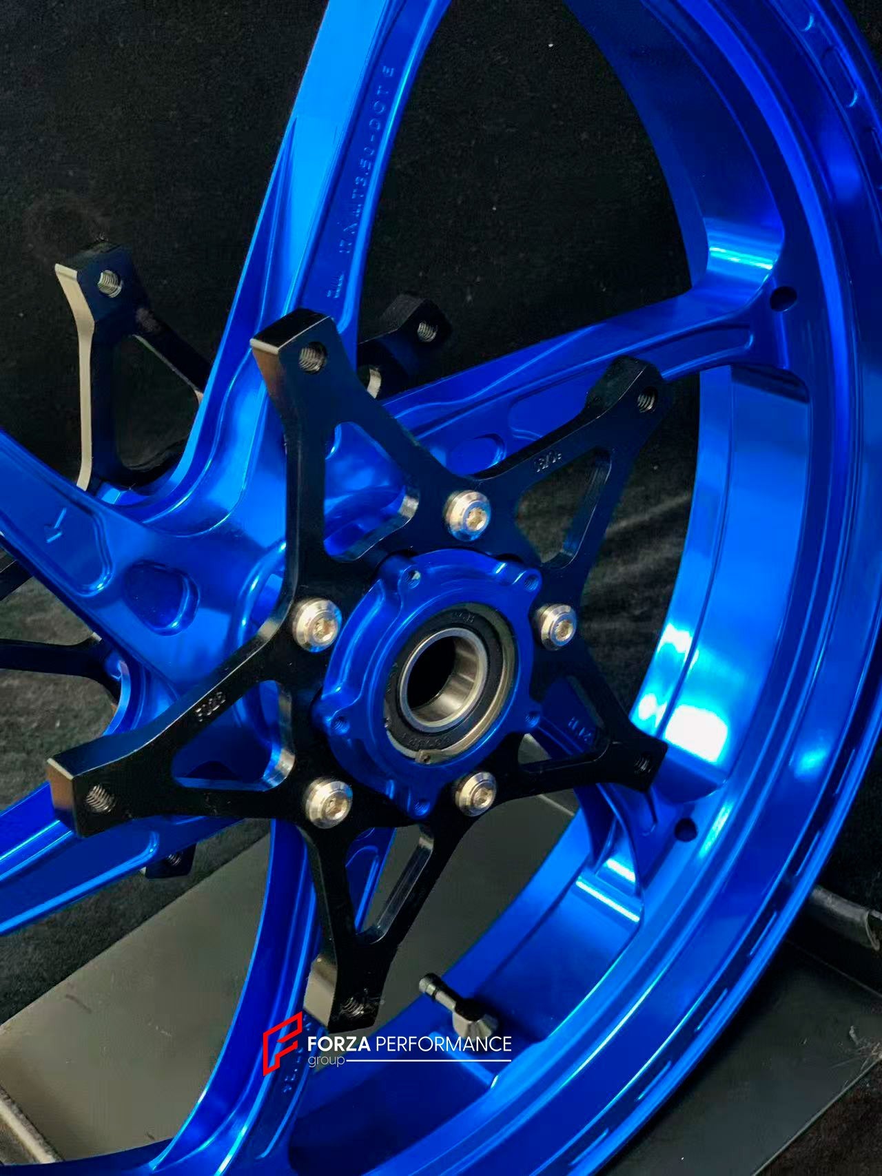 We manufacture premium quality forged motorcycle wheels rims for S1000RR M1000RR in any design, size, color.

Wheel sizes (motorcycle spec):

Front: 3.5 x 17

Rear: 6 x 17

Weight:

Front: 3.25 kg (7.16 lbs)

Rear: 4.35 kg (9.59 lbs)


Finishing: Gloss Blue

Forza Performance Group engineers and manufactures each forged motorcycle wheel individually per order. This ensures precise fitment, uncompromised strength, and unique styling. Whether for racing, touring, or daily use — our wheels are built for both p