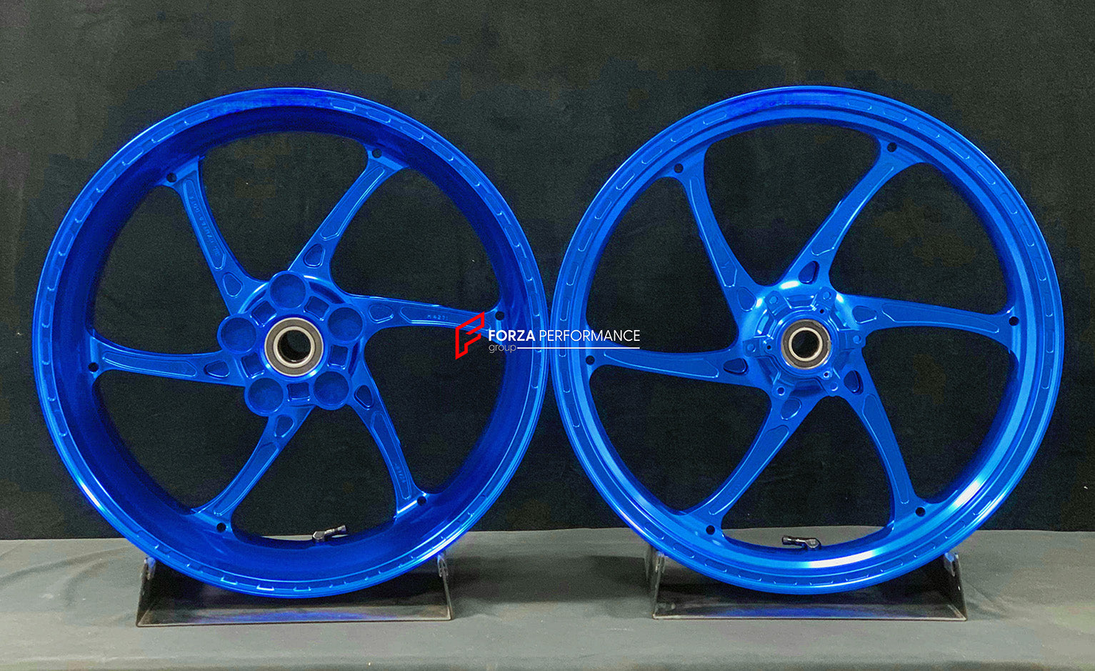 We manufacture premium quality forged motorcycle wheels rims for S1000RR M1000RR in any design, size, color.

Wheel sizes (motorcycle spec):

Front: 3.5 x 17

Rear: 6 x 17

Weight:

Front: 3.25 kg (7.16 lbs)

Rear: 4.35 kg (9.59 lbs)


Finishing: Gloss Blue

Forza Performance Group engineers and manufactures each forged motorcycle wheel individually per order. This ensures precise fitment, uncompromised strength, and unique styling. Whether for racing, touring, or daily use — our wheels are built for both p