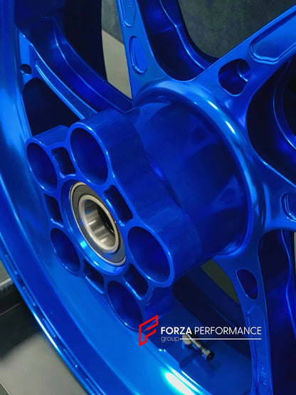 We manufacture premium quality forged motorcycle wheels rims for S1000RR M1000RR in any design, size, color.

Wheel sizes (motorcycle spec):

Front: 3.5 x 17

Rear: 6 x 17

Weight:

Front: 3.25 kg (7.16 lbs)

Rear: 4.35 kg (9.59 lbs)


Finishing: Gloss Blue

Forza Performance Group engineers and manufactures each forged motorcycle wheel individually per order. This ensures precise fitment, uncompromised strength, and unique styling. Whether for racing, touring, or daily use — our wheels are built for both p