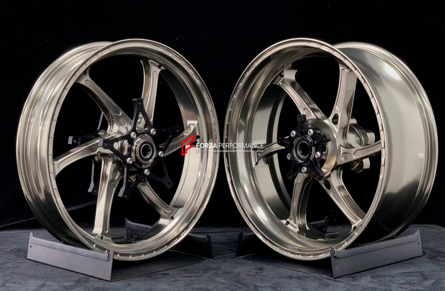 We manufacture premium quality forged motorcycle wheels rims for S1000RR M1000RR in any design, size, color.

Wheel sizes (motorcycle spec):

Front: 3.5 x 17

Rear: 6 x 17

Weight:

Front: 3.75 kg (7.16 lbs)

Rear: 4.4 kg (9.59 lbs)


Finishing: Satin Blonze

Forza Performance Group engineers and manufactures each forged motorcycle wheel individually per order. This ensures precise fitment, uncompromised strength, and unique styling. Whether for racing, touring, or daily use — our wheels are built for both 