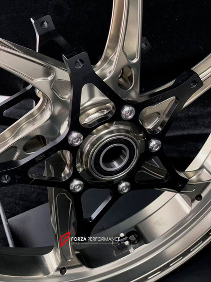 We manufacture premium quality forged motorcycle wheels rims for S1000RR M1000RR in any design, size, color.

Wheel sizes (motorcycle spec):

Front: 3.5 x 17

Rear: 6 x 17

Weight:

Front: 3.75 kg (7.16 lbs)

Rear: 4.4 kg (9.59 lbs)


Finishing: Satin Blonze

Forza Performance Group engineers and manufactures each forged motorcycle wheel individually per order. This ensures precise fitment, uncompromised strength, and unique styling. Whether for racing, touring, or daily use — our wheels are built for both 