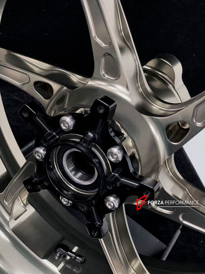We manufacture premium quality forged motorcycle wheels rims for S1000RR M1000RR in any design, size, color.

Wheel sizes (motorcycle spec):

Front: 3.5 x 17

Rear: 6 x 17

Weight:

Front: 3.75 kg (7.16 lbs)

Rear: 4.4 kg (9.59 lbs)


Finishing: Satin Blonze

Forza Performance Group engineers and manufactures each forged motorcycle wheel individually per order. This ensures precise fitment, uncompromised strength, and unique styling. Whether for racing, touring, or daily use — our wheels are built for both 