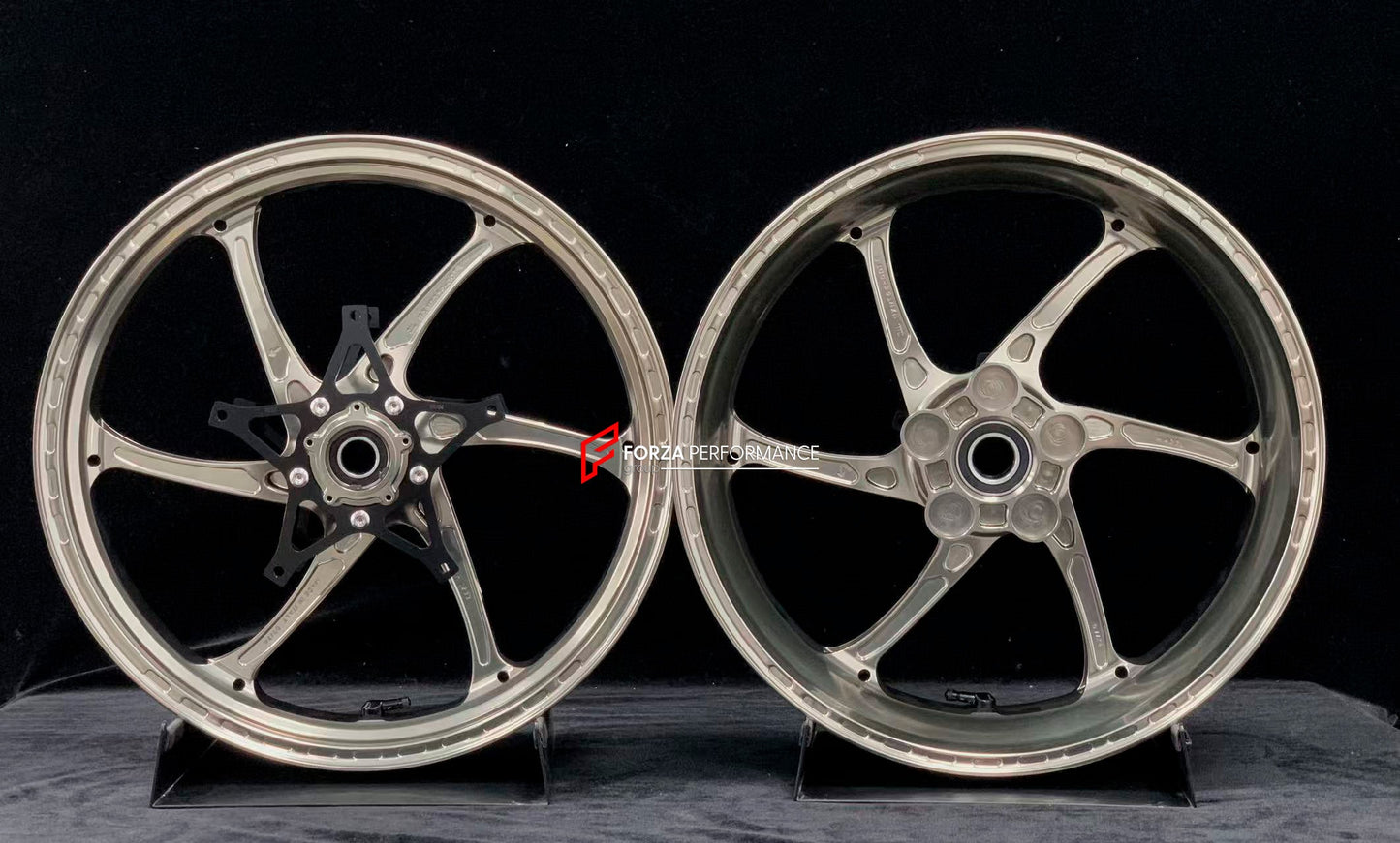 We manufacture premium quality forged motorcycle wheels rims for S1000RR M1000RR in any design, size, color.

Wheel sizes (motorcycle spec):

Front: 3.5 x 17

Rear: 6 x 17

Weight:

Front: 3.75 kg (7.16 lbs)

Rear: 4.4 kg (9.59 lbs)


Finishing: Satin Blonze

Forza Performance Group engineers and manufactures each forged motorcycle wheel individually per order. This ensures precise fitment, uncompromised strength, and unique styling. Whether for racing, touring, or daily use — our wheels are built for both 