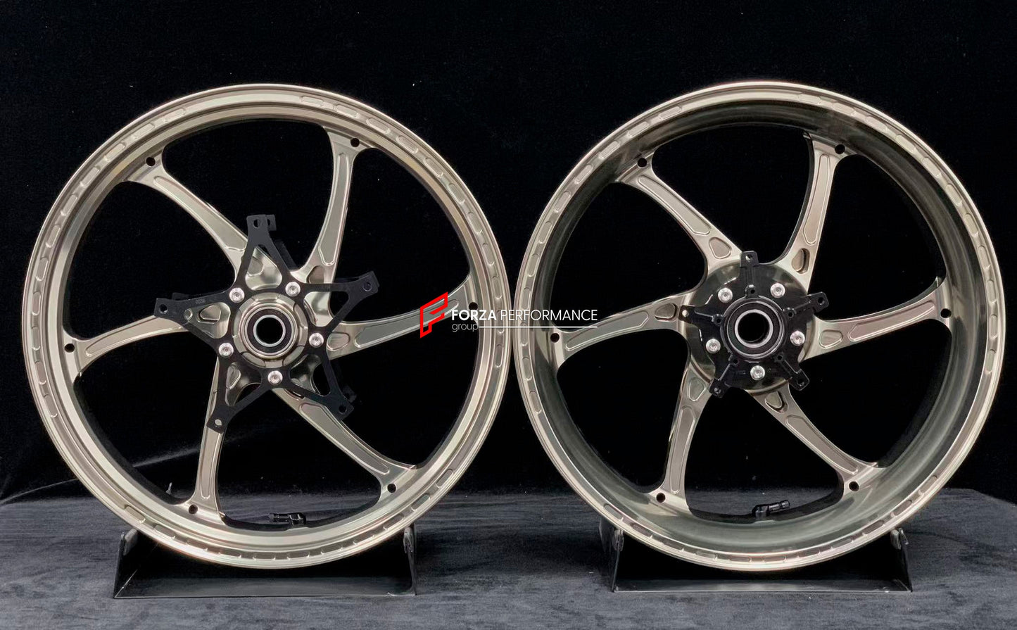 We manufacture premium quality forged motorcycle wheels rims for S1000RR M1000RR in any design, size, color.

Wheel sizes (motorcycle spec):

Front: 3.5 x 17

Rear: 6 x 17

Weight:

Front: 3.75 kg (7.16 lbs)

Rear: 4.4 kg (9.59 lbs)


Finishing: Satin Blonze

Forza Performance Group engineers and manufactures each forged motorcycle wheel individually per order. This ensures precise fitment, uncompromised strength, and unique styling. Whether for racing, touring, or daily use — our wheels are built for both 