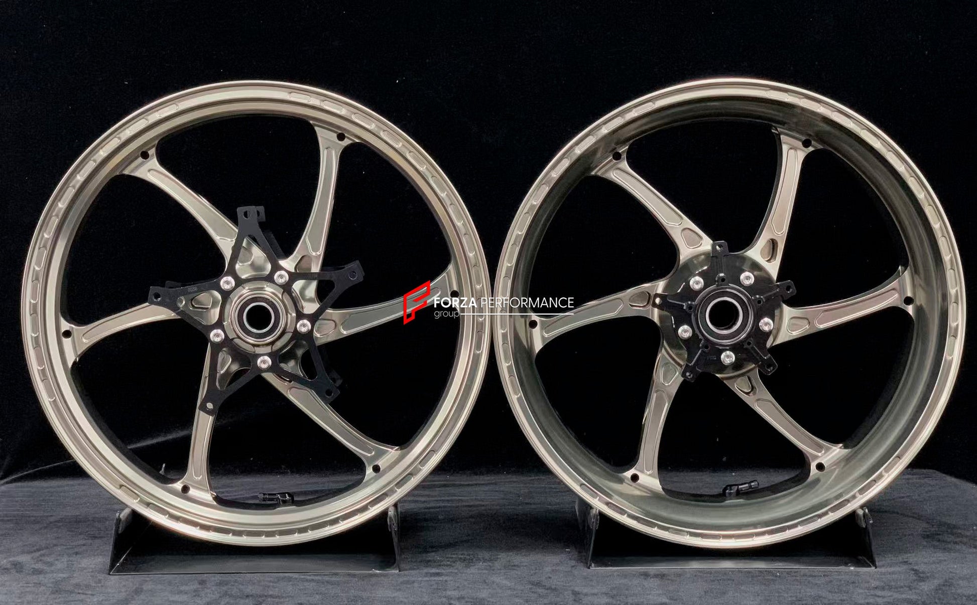 We manufacture premium quality forged motorcycle wheels rims for S1000RR M1000RR in any design, size, color.

Wheel sizes (motorcycle spec):

Front: 3.5 x 17

Rear: 6 x 17

Weight:

Front: 3.75 kg (7.16 lbs)

Rear: 4.4 kg (9.59 lbs)


Finishing: Satin Blonze

Forza Performance Group engineers and manufactures each forged motorcycle wheel individually per order. This ensures precise fitment, uncompromised strength, and unique styling. Whether for racing, touring, or daily use — our wheels are built for both 