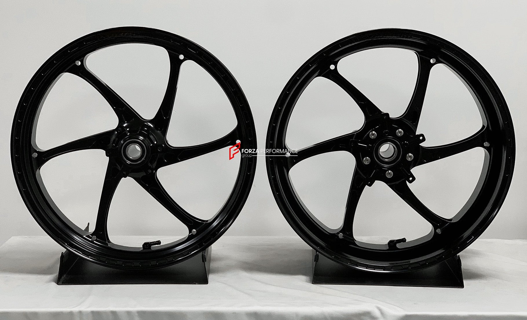 We manufacture premium quality forged motorcycle wheels rims for S1000RR M1000RR in any design, size, color.

Wheel sizes (motorcycle spec):

Front: 3.5 x 17

Rear: 6 x 17

Weight:

Front: 3.25 kg (7.16 lbs)

Rear: 4.5 kg (9.92 lbs)


Finishing: Satin Black

Forza Performance Group engineers and manufactures each forged motorcycle wheel individually per order. This ensures precise fitment, uncompromised strength, and unique styling. Whether for racing, touring, or daily use — our wheels are built for both p