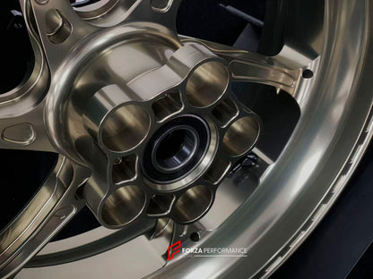 We manufacture premium quality forged motorcycle wheels rims for S1000RR M1000RR in any design, size, color.

Wheel sizes (motorcycle spec):

Front: 3.5 x 17

Rear: 6 x 17

Weight:

Front: 3.25 kg (7.16 lbs)

Rear: 4.4 kg (9.7 lbs)


Finishing: Satin Bronze

Forza Performance Group engineers and manufactures each forged motorcycle wheel individually per order. This ensures precise fitment, uncompromised strength, and unique styling. Whether for racing, touring, or daily use — our wheels are built for both p