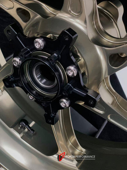 We manufacture premium quality forged motorcycle wheels rims for S1000RR M1000RR in any design, size, color.

Wheel sizes (motorcycle spec):

Front: 3.5 x 17

Rear: 6 x 17

Weight:

Front: 3.25 kg (7.16 lbs)

Rear: 4.4 kg (9.7 lbs)


Finishing: Satin Bronze

Forza Performance Group engineers and manufactures each forged motorcycle wheel individually per order. This ensures precise fitment, uncompromised strength, and unique styling. Whether for racing, touring, or daily use — our wheels are built for both p