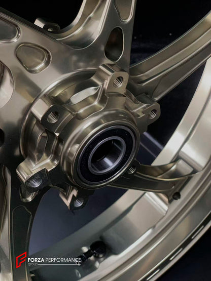 We manufacture premium quality forged motorcycle wheels rims for S1000RR M1000RR in any design, size, color.

Wheel sizes (motorcycle spec):

Front: 3.5 x 17

Rear: 6 x 17

Weight:

Front: 3.25 kg (7.16 lbs)

Rear: 4.4 kg (9.7 lbs)


Finishing: Satin Bronze

Forza Performance Group engineers and manufactures each forged motorcycle wheel individually per order. This ensures precise fitment, uncompromised strength, and unique styling. Whether for racing, touring, or daily use — our wheels are built for both p