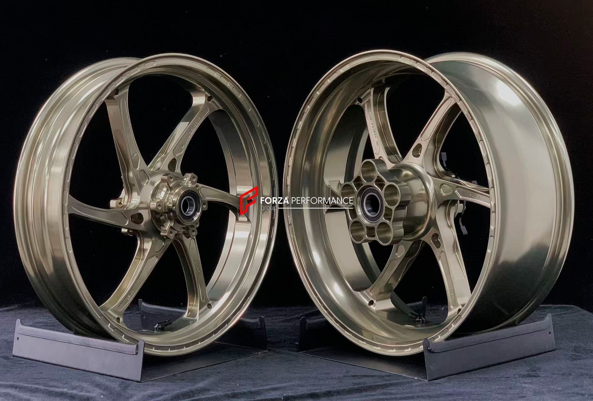 We manufacture premium quality forged motorcycle wheels rims for S1000RR M1000RR in any design, size, color.

Wheel sizes (motorcycle spec):

Front: 3.5 x 17

Rear: 6 x 17

Weight:

Front: 3.25 kg (7.16 lbs)

Rear: 4.4 kg (9.7 lbs)


Finishing: Satin Bronze

Forza Performance Group engineers and manufactures each forged motorcycle wheel individually per order. This ensures precise fitment, uncompromised strength, and unique styling. Whether for racing, touring, or daily use — our wheels are built for both p