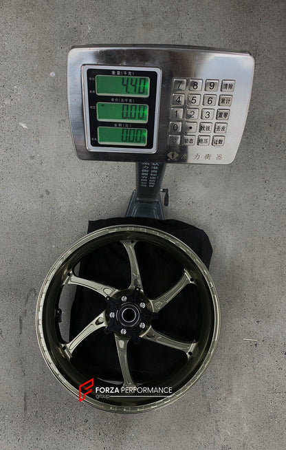 We manufacture premium quality forged motorcycle wheels rims for S1000RR M1000RR in any design, size, color.

Wheel sizes (motorcycle spec):

Front: 3.5 x 17

Rear: 6 x 17

Weight:

Front: 3.25 kg (7.16 lbs)

Rear: 4.4 kg (9.7 lbs)


Finishing: Satin Bronze

Forza Performance Group engineers and manufactures each forged motorcycle wheel individually per order. This ensures precise fitment, uncompromised strength, and unique styling. Whether for racing, touring, or daily use — our wheels are built for both p