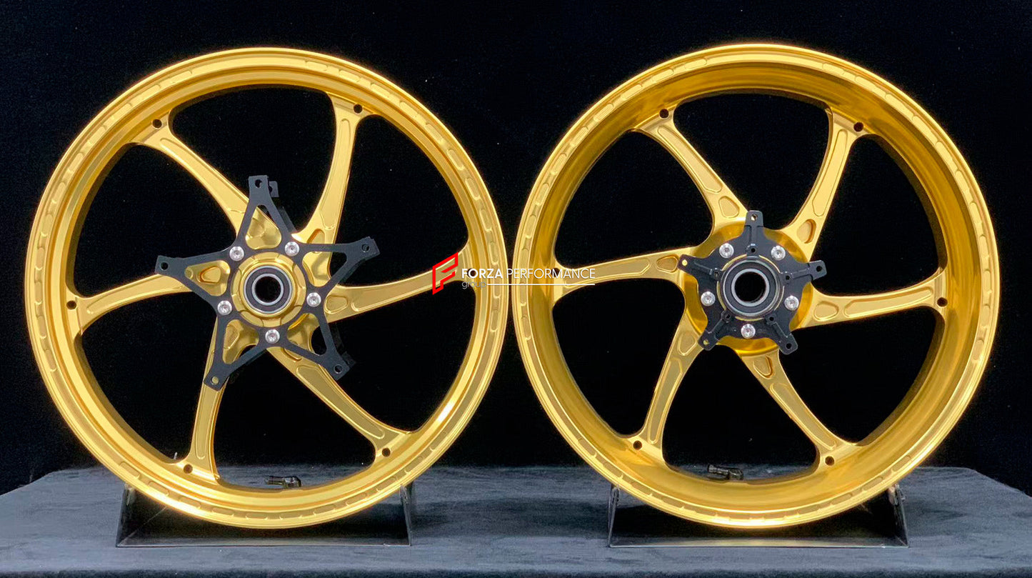 We manufacture premium quality forged motorcycle wheels rims for S1000RR M1000RR in any design, size, color.

Wheel sizes (motorcycle spec):

Front: 3.5 x 17

Rear: 6 x 17

Weight:

Front: 3.75 kg (8.27 lbs)

Rear: 4.4 kg (9.7 lbs)

Finishing: Satin Gold

Forza Performance Group engineers and manufactures each forged motorcycle wheel individually per order. This ensures precise fitment, uncompromised strength, and unique styling. Whether for racing, touring, or daily use — our wheels are built for both perf
