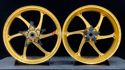 We manufacture premium quality forged motorcycle wheels rims for S1000RR M1000RR in any design, size, color.

Wheel sizes (motorcycle spec):

Front: 3.5 x 17

Rear: 6 x 17

Weight:

Front: 3.75 kg (8.27 lbs)

Rear: 4.4 kg (9.7 lbs)

Finishing: Satin Gold

Forza Performance Group engineers and manufactures each forged motorcycle wheel individually per order. This ensures precise fitment, uncompromised strength, and unique styling. Whether for racing, touring, or daily use — our wheels are built for both perf