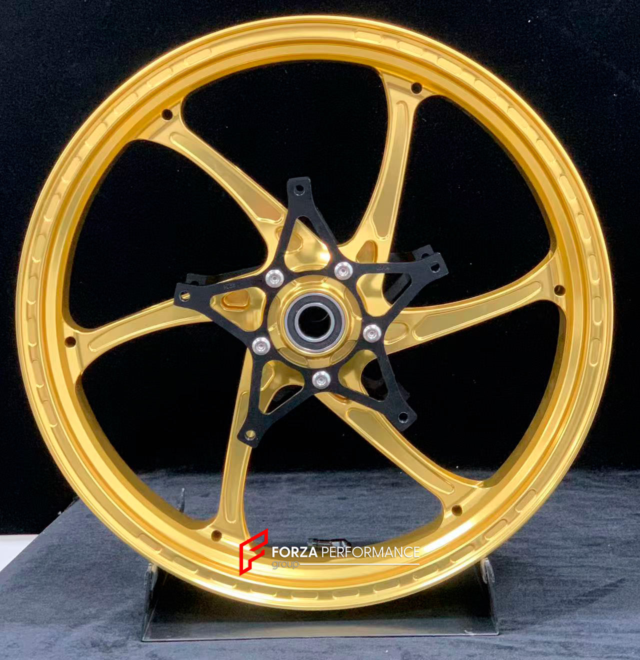 We manufacture premium quality forged motorcycle wheels rims for S1000RR M1000RR in any design, size, color.

Wheel sizes (motorcycle spec):

Front: 3.5 x 17

Rear: 6 x 17

Weight:

Front: 3.75 kg (8.27 lbs)

Rear: 4.4 kg (9.7 lbs)

Finishing: Satin Gold

Forza Performance Group engineers and manufactures each forged motorcycle wheel individually per order. This ensures precise fitment, uncompromised strength, and unique styling. Whether for racing, touring, or daily use — our wheels are built for both perf