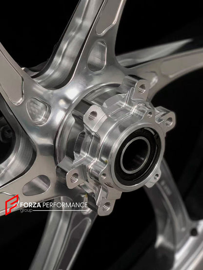 We manufacture premium quality forged motorcycle wheels rims for BMW S1000RR M1000RR in any design, size, color.

Wheel sizes (motorcycle spec):

Front: 3.5 x 17

Rear: 6 x 17

Weight:

Front: 3.15 kg (6.94 lbs)

Rear: 4.4 kg (9.7 lbs)

Finishing: Gloss Silver

Forza Performance Group engineers and manufactures each forged motorcycle wheel individually per order. This ensures precise fitment, uncompromised strength, and unique styling. Whether for racing, touring, or daily use — our wheels are built for bot