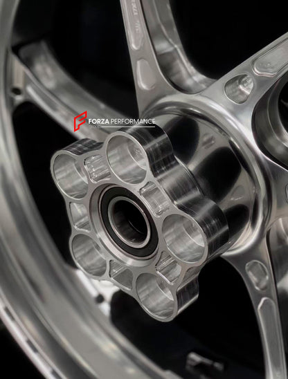 We manufacture premium quality forged motorcycle wheels rims for BMW S1000RR M1000RR in any design, size, color.

Wheel sizes (motorcycle spec):

Front: 3.5 x 17

Rear: 6 x 17

Weight:

Front: 3.15 kg (6.94 lbs)

Rear: 4.4 kg (9.7 lbs)

Finishing: Gloss Silver

Forza Performance Group engineers and manufactures each forged motorcycle wheel individually per order. This ensures precise fitment, uncompromised strength, and unique styling. Whether for racing, touring, or daily use — our wheels are built for bot