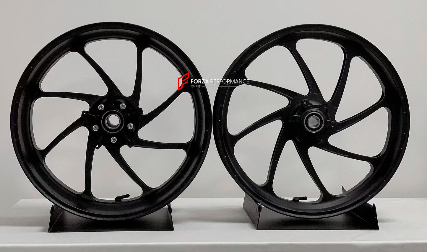 We manufacture premium quality forged motorcycle wheels rims for BMW S1000RR M1000RR in any design, size, color.

Wheel sizes (motorcycle spec):

Front: 3.5 x 17

Rear: 6 x 17

Weight:

Front: 3.35 kg (7.38 lbs)

Rear: 4.25 kg (9.37 lbs)


Finishing: Matt Black

Forza Performance Group engineers and manufactures each forged motorcycle wheel individually per order. This ensures precise fitment, uncompromised strength, and unique styling. Whether for racing, touring, or daily use — our wheels are built for bo