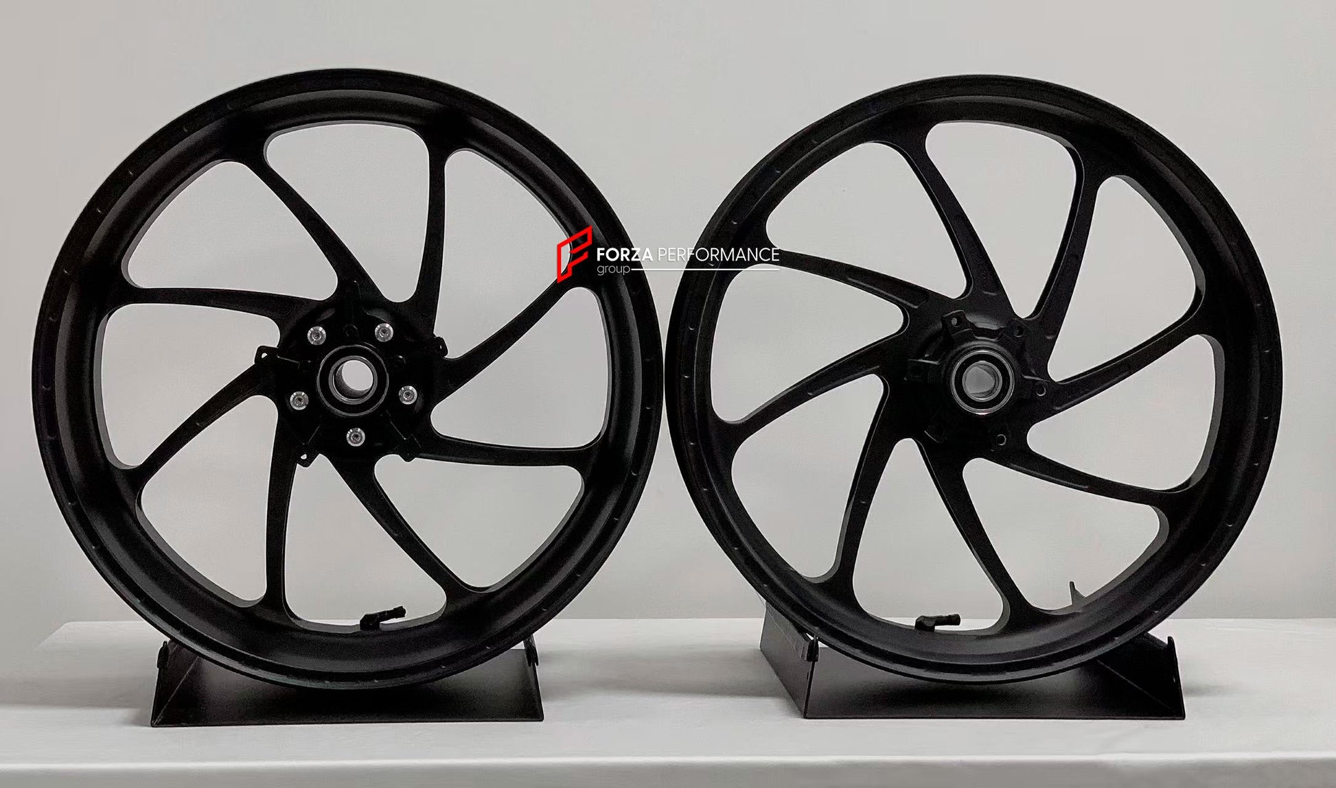 We manufacture premium quality forged motorcycle wheels rims for BMW S1000RR M1000RR in any design, size, color.

Wheel sizes (motorcycle spec):

Front: 3.5 x 17

Rear: 6 x 17

Weight:

Front: 3.35 kg (7.38 lbs)

Rear: 4.25 kg (9.37 lbs)


Finishing: Matt Black

Forza Performance Group engineers and manufactures each forged motorcycle wheel individually per order. This ensures precise fitment, uncompromised strength, and unique styling. Whether for racing, touring, or daily use — our wheels are built for bo