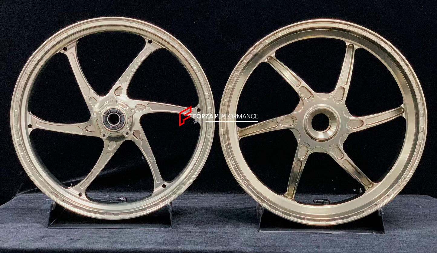 We manufacture premium quality forged motorcycle wheels rims for DUCATI HYPERMOTARD 698 MONO 950 950 RVE 950 SP in any design, size, color.

Wheel sizes (motorcycle spec):

Front: 3.5 x 17

Rear: 5.5 x 17

Weight:

Front: 3.3 kg (7.27 lbs)

Rear: 3.75 kg (8.27 lbs)


Finishing: Satin light gold

Forza Performance Group engineers and manufactures each forged motorcycle wheel individually per order. This ensures precise fitment, uncompromised strength, and unique styling. Whether for racing, touring, or daily