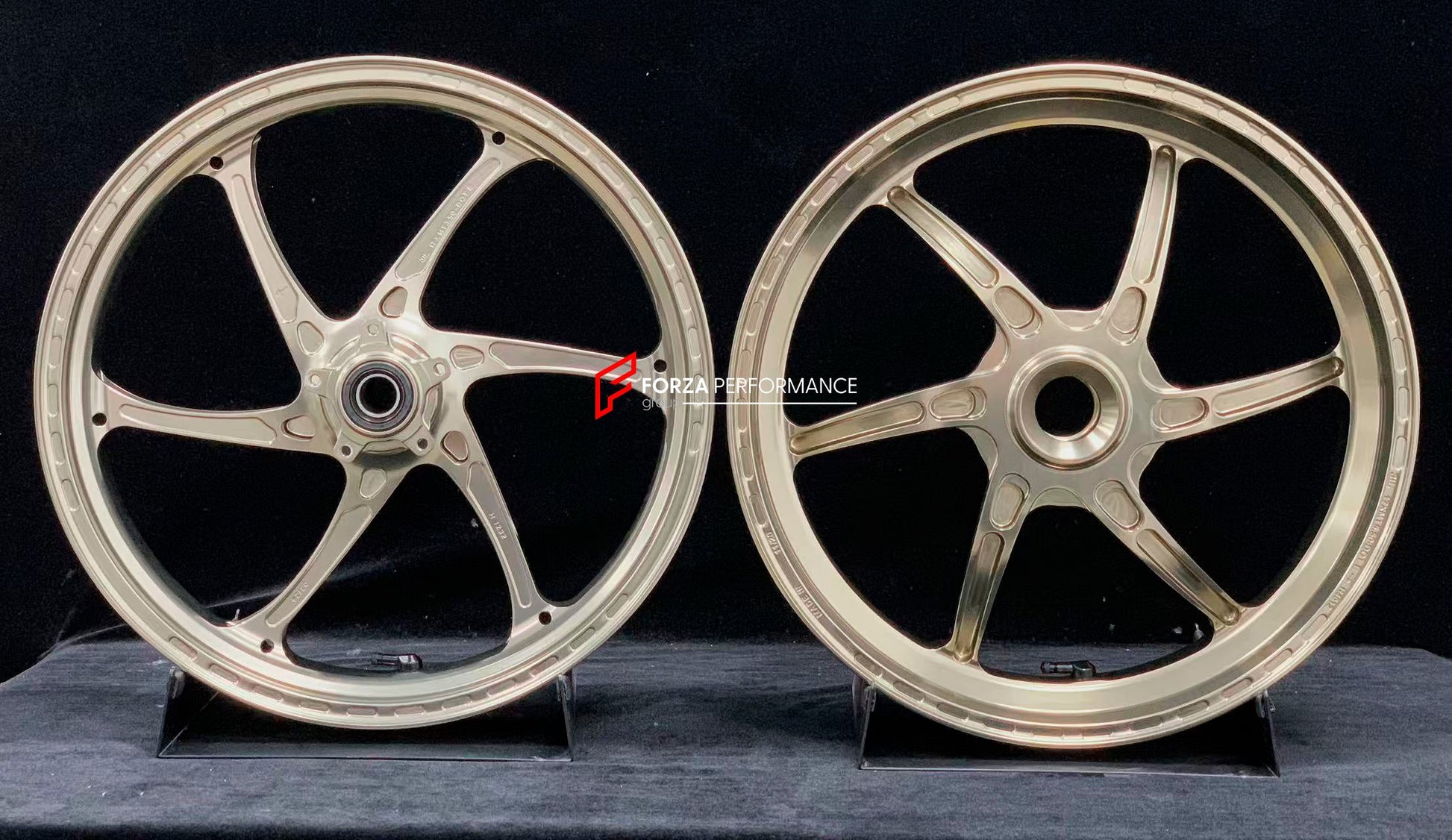 We manufacture premium quality forged motorcycle wheels rims for DUCATI HYPERMOTARD 698 MONO 950 950 RVE 950 SP in any design, size, color.

Wheel sizes (motorcycle spec):

Front: 3.5 x 17

Rear: 5.5 x 17

Weight:

Front: 3.3 kg (7.27 lbs)

Rear: 3.75 kg (8.27 lbs)


Finishing: Satin light gold

Forza Performance Group engineers and manufactures each forged motorcycle wheel individually per order. This ensures precise fitment, uncompromised strength, and unique styling. Whether for racing, touring, or daily