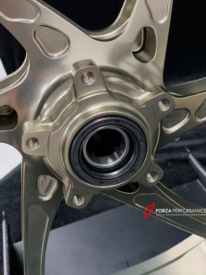 We manufacture premium quality forged motorcycle wheels rims for DUCATI HYPERMOTARD 698 MONO 950 950 RVE 950 SP in any design, size, color.

Wheel sizes (motorcycle spec):

Front: 3.5 x 17

Rear: 5.5 x 17

Weight:

Front: 3.3 kg (7.27 lbs)

Rear: 3.75 kg (8.27 lbs)


Finishing: Satin light gold

Forza Performance Group engineers and manufactures each forged motorcycle wheel individually per order. This ensures precise fitment, uncompromised strength, and unique styling. Whether for racing, touring, or daily