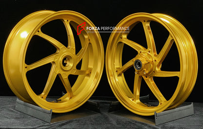 We manufacture premium quality forged motorcycle wheels rims for DUCATI HYPERMOTARD 698 MONO 950 950 RVE 950 SP in any design, size, color.

Wheel sizes (motorcycle spec):

Front: 3.5 x 17

Rear: 5.5 x 17

Weight:

Front: 3.8 kg (6.61 lbs)

Rear: 4.15 kg (8.82 lbs)


Finishing: Satin Gold

Forza Performance Group engineers and manufactures each forged motorcycle wheel individually per order. This ensures precise fitment, uncompromised strength, and unique styling. Whether for racing, touring, or daily use 