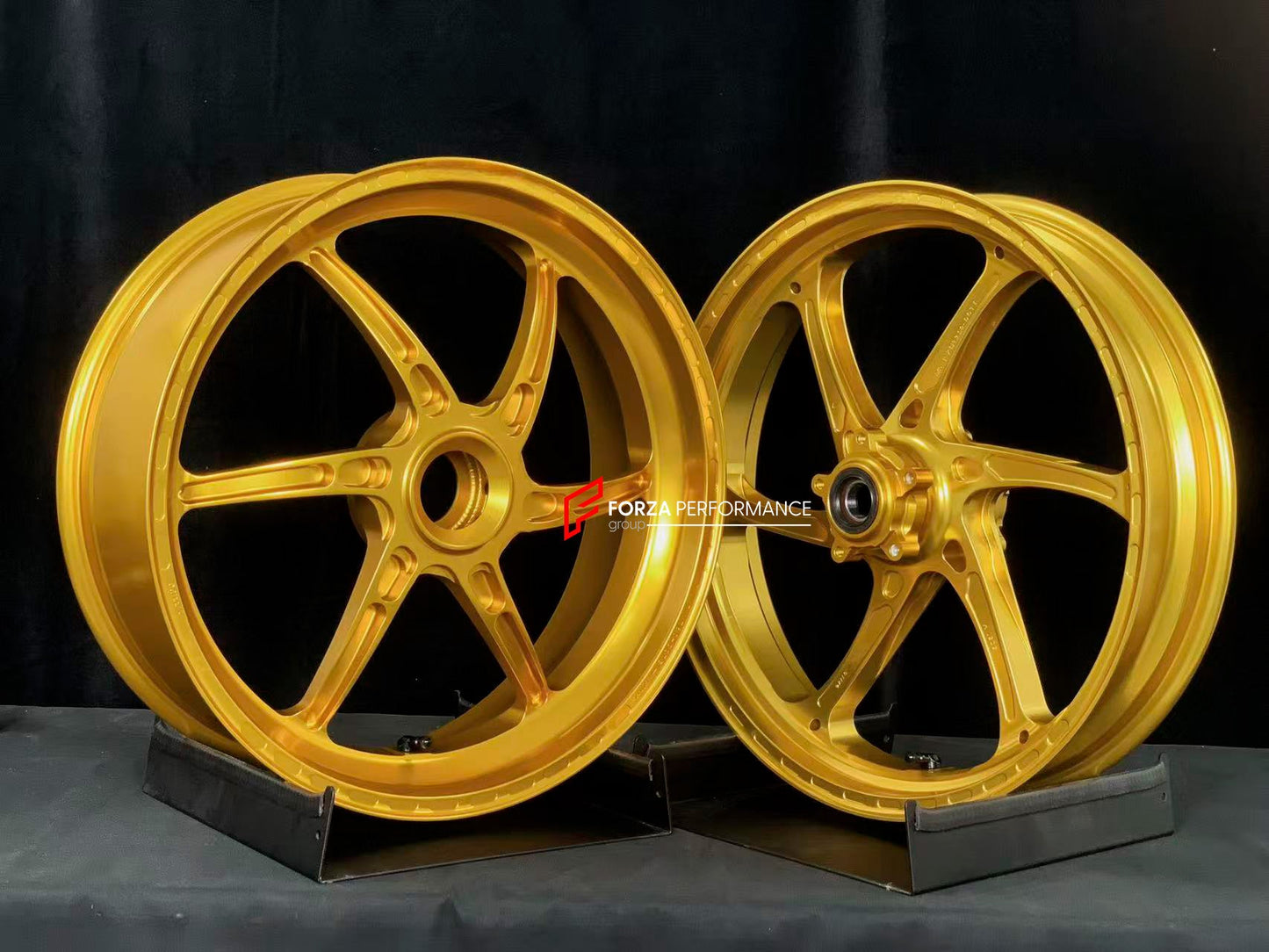 We manufacture premium quality forged motorcycle wheels rims for DUCATI MULTISTRADA V4 V4S V4RS V4 RALLY V4 PIKES PEAK in any design, size, color.

Wheel sizes (motorcycle spec):

Front: 3.0 x 19

Rear: 4.5 x 17

Weight:

Front: 3.45 kg (7.6 lbs)

Rear: 3.3 kg (7.27 lbs)

Finishing: Satin Gold

Forza Performance Group engineers and manufactures each forged motorcycle wheel individually per order. This ensures precise fitment, uncompromised strength, and unique styling. Whether for racing, touring, or daily 