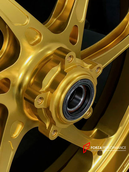 We manufacture premium quality forged motorcycle wheels rims for DUCATI MULTISTRADA V4 V4S V4RS V4 RALLY V4 PIKES PEAK in any design, size, color.

Wheel sizes (motorcycle spec):

Front: 3.0 x 19

Rear: 4.5 x 17

Weight:

Front: 3.45 kg (7.6 lbs)

Rear: 3.3 kg (7.27 lbs)

Finishing: Satin Gold

Forza Performance Group engineers and manufactures each forged motorcycle wheel individually per order. This ensures precise fitment, uncompromised strength, and unique styling. Whether for racing, touring, or daily 