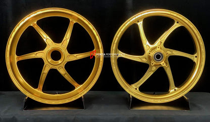 We manufacture premium quality forged motorcycle wheels rims for DUCATI MULTISTRADA V4 V4S V4RS V4 RALLY V4 PIKES PEAK in any design, size, color.

Wheel sizes (motorcycle spec):

Front: 3.0 x 19

Rear: 4.5 x 17

Weight:

Front: 3.45 kg (7.6 lbs)

Rear: 3.3 kg (7.27 lbs)

Finishing: Satin Gold

Forza Performance Group engineers and manufactures each forged motorcycle wheel individually per order. This ensures precise fitment, uncompromised strength, and unique styling. Whether for racing, touring, or daily 