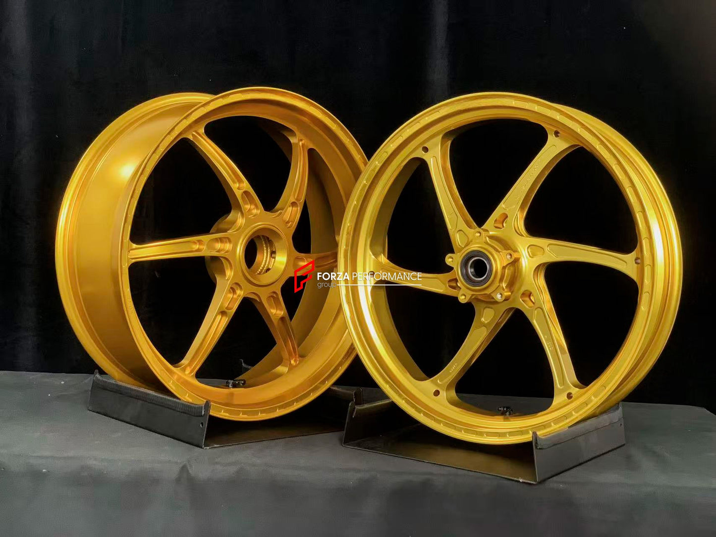 We manufacture premium quality forged motorcycle wheels rims for DUCATI PANIGALE V4 V4S V4R V4 SP2 in any design, size, color.

Wheel sizes (motorcycle spec):

Front: 3.5 x 17

Rear: 6 x 17

Weight:

Front: 3.3 kg (7.27 lbs)

Rear: 3.45 kg (7.6 lbs)


Finishing: Satin Gold

Forza Performance Group engineers and manufactures each forged motorcycle wheel individually per order. This ensures precise fitment, uncompromised strength, and unique styling. Whether for racing, touring, or daily use — our wheels are 